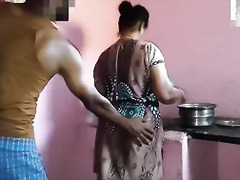 Aunty was working in the kitchen when I had sex with her